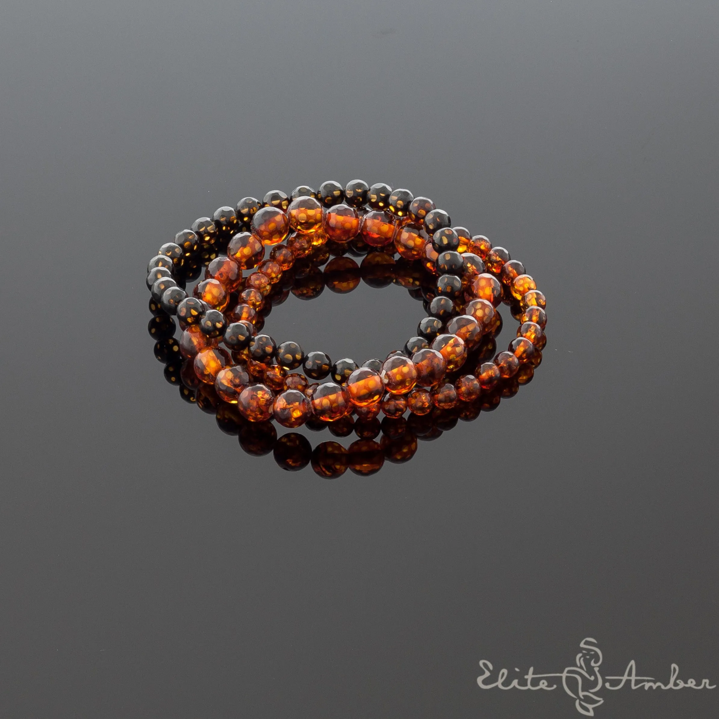 Amber bracelet "Faceted balls"