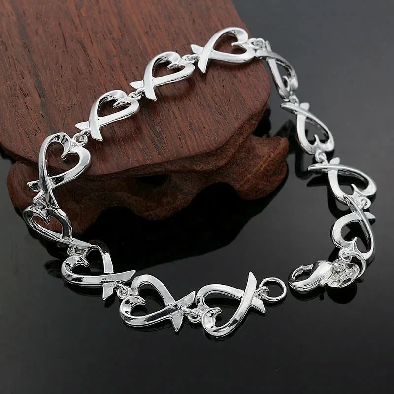 JC - Silver Star Charm Bracelet: 925 sterling, perfect for women’s weddings and holiday gifts