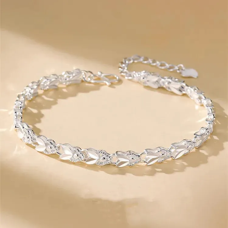 JC - Silver Star Charm Bracelet: 925 sterling, perfect for women’s weddings and holiday gifts