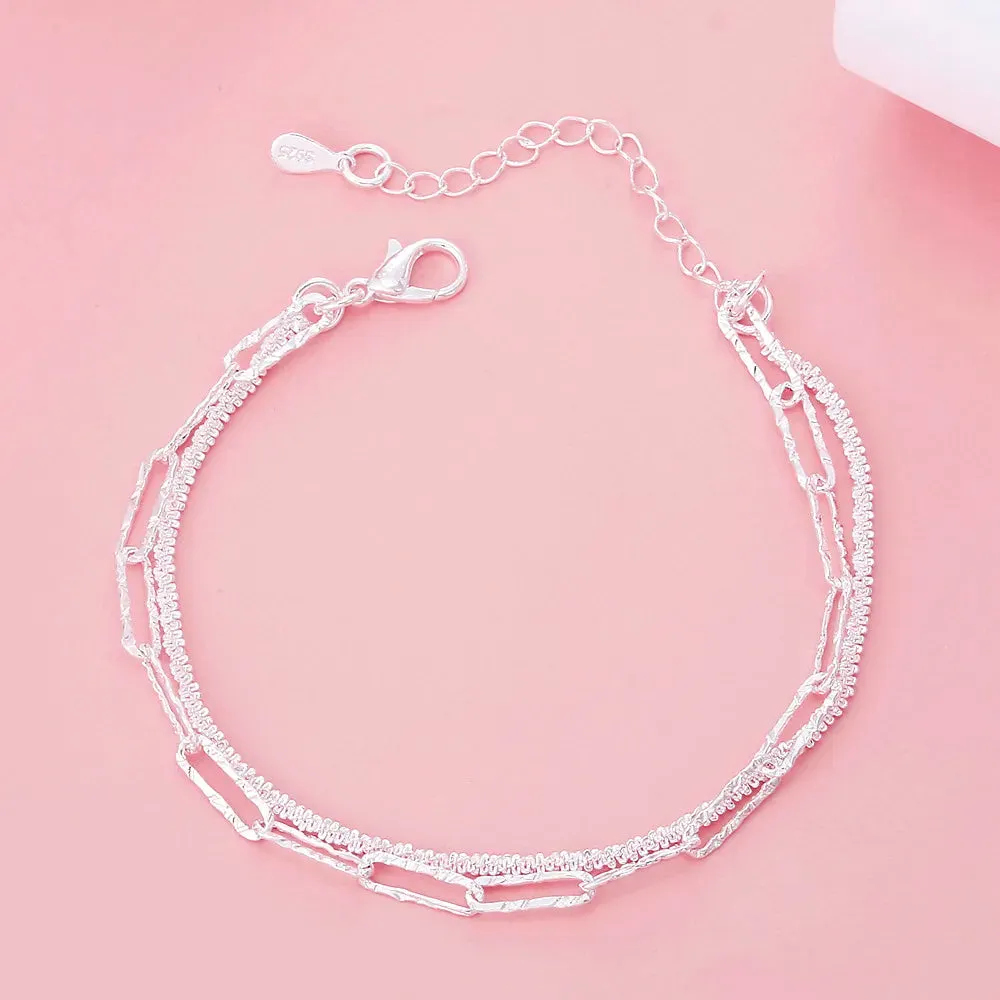 JC - Silver Star Charm Bracelet: 925 sterling, perfect for women’s weddings and holiday gifts